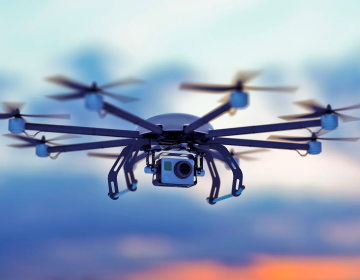 Drone in the sky with the sun setting